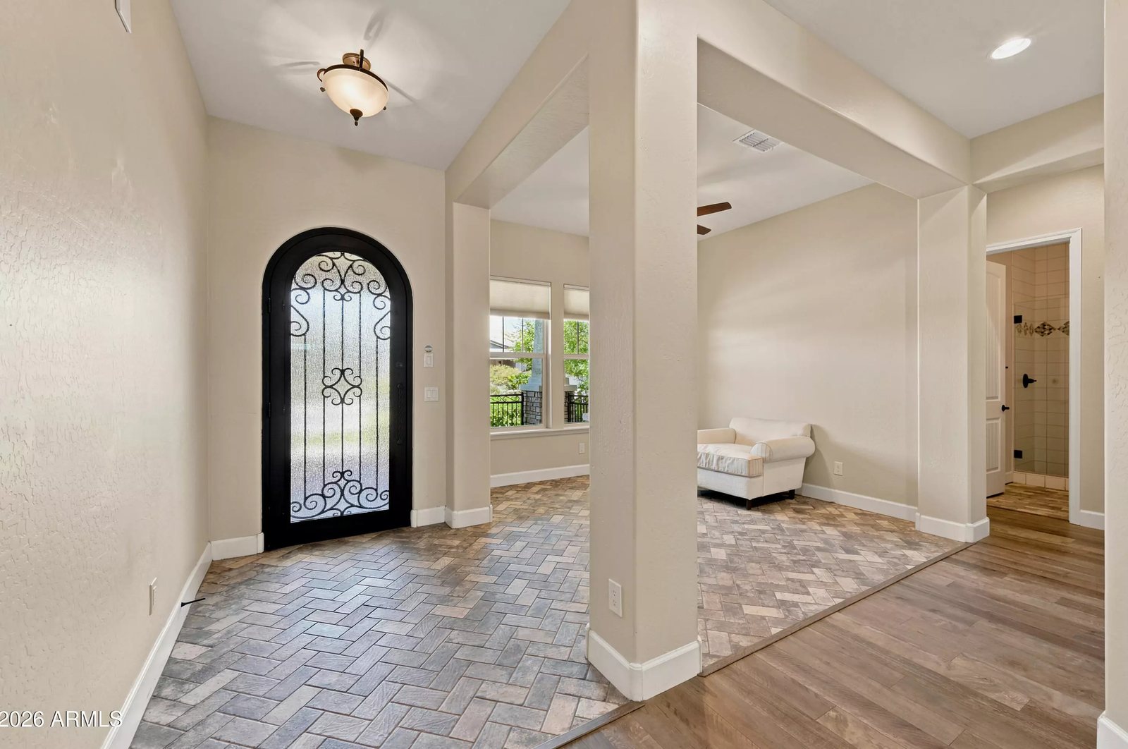 Entryway with wood-look flooring in a Litchfield Park, Arizona brokerage listing