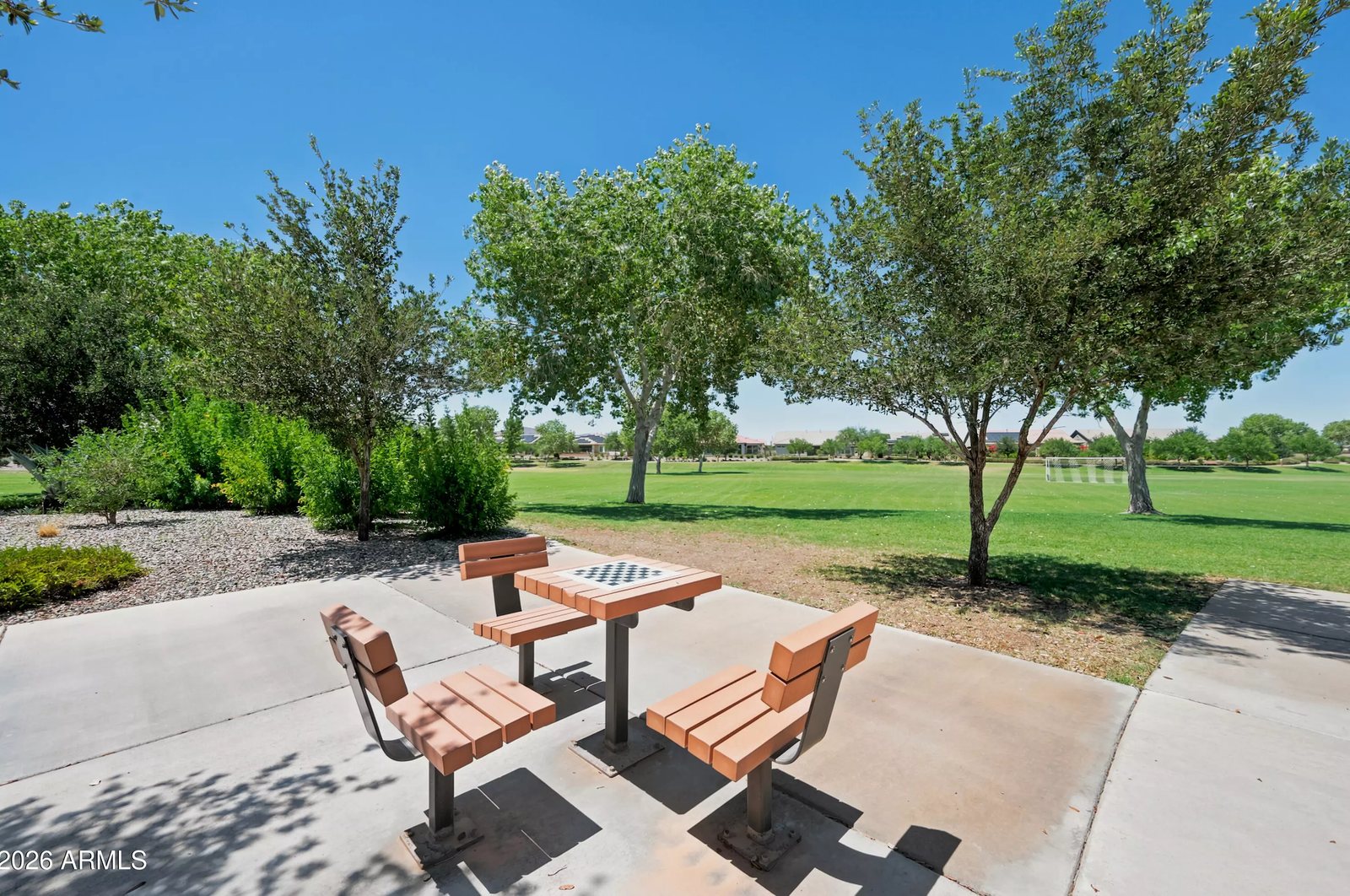 Outdoor dining area backing to the park in a Litchfield Park, Arizona brokerage listing