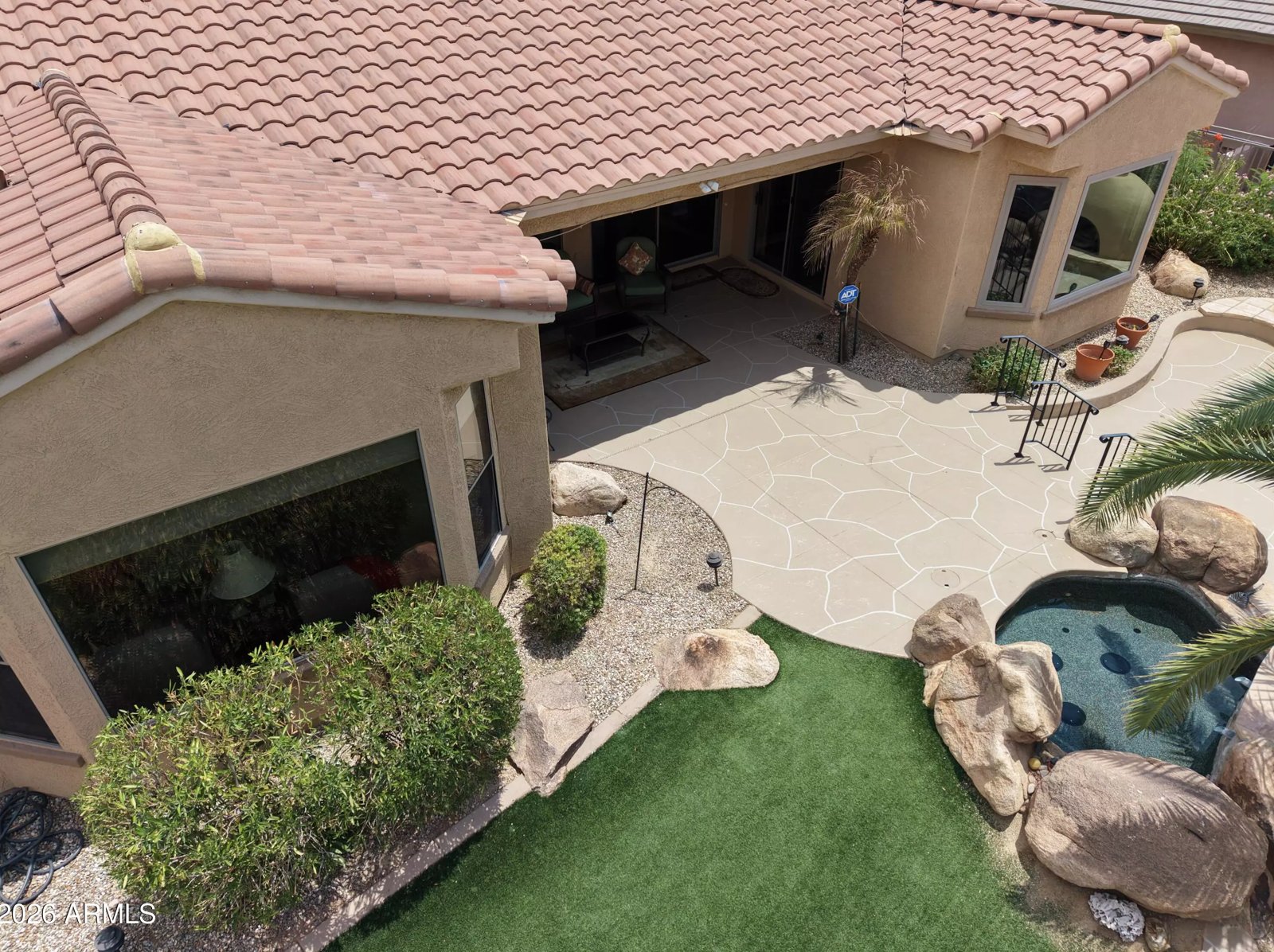 Backyard spa and patio in a Surprise, Arizona brokerage listing