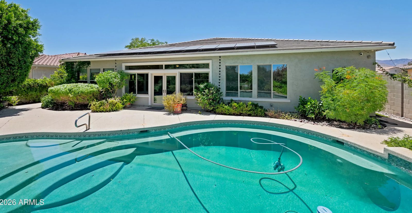 Backyard pool and rear elevation of a Litchfield Park, Arizona brokerage listing