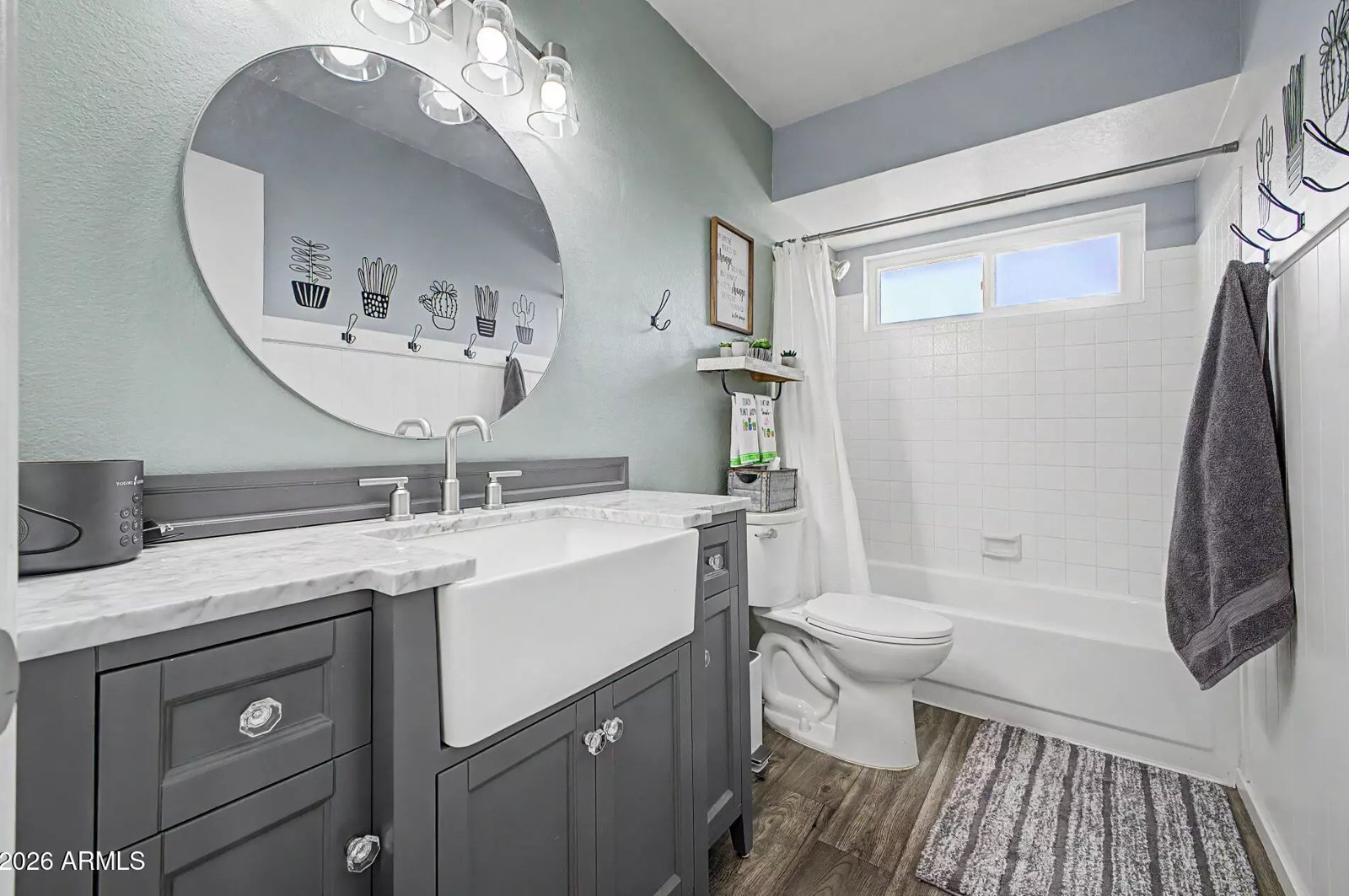 Updated bathroom with farmhouse sink in a Glendale, Arizona brokerage listing