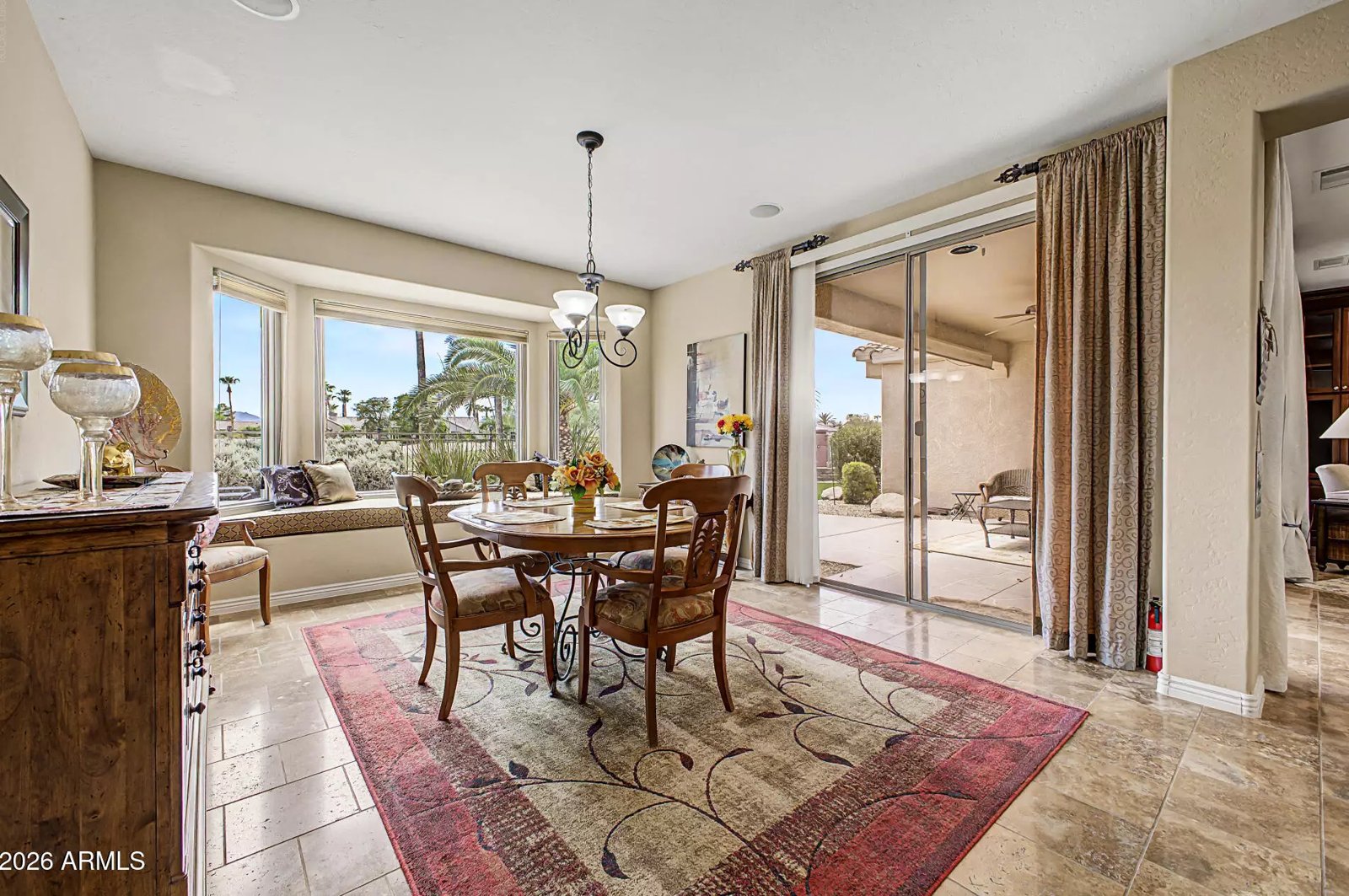 Dining area with patio access in a Surprise, Arizona brokerage listing