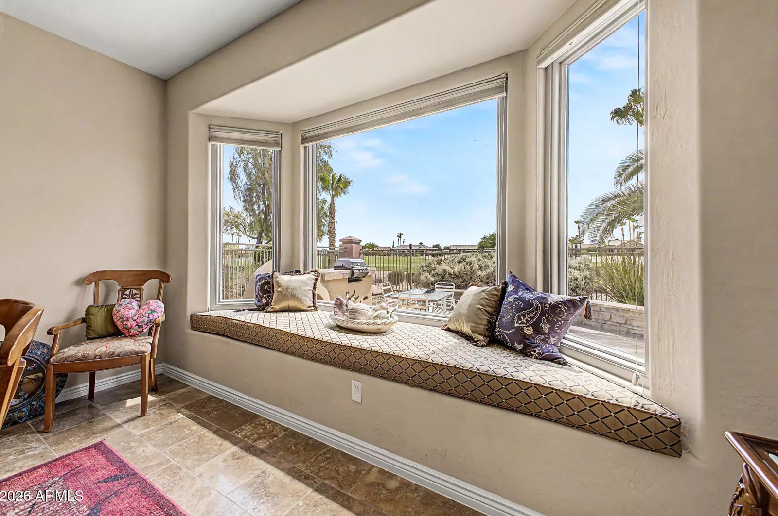 Bay window seat overlooking the golf course in a Surprise, Arizona brokerage listing