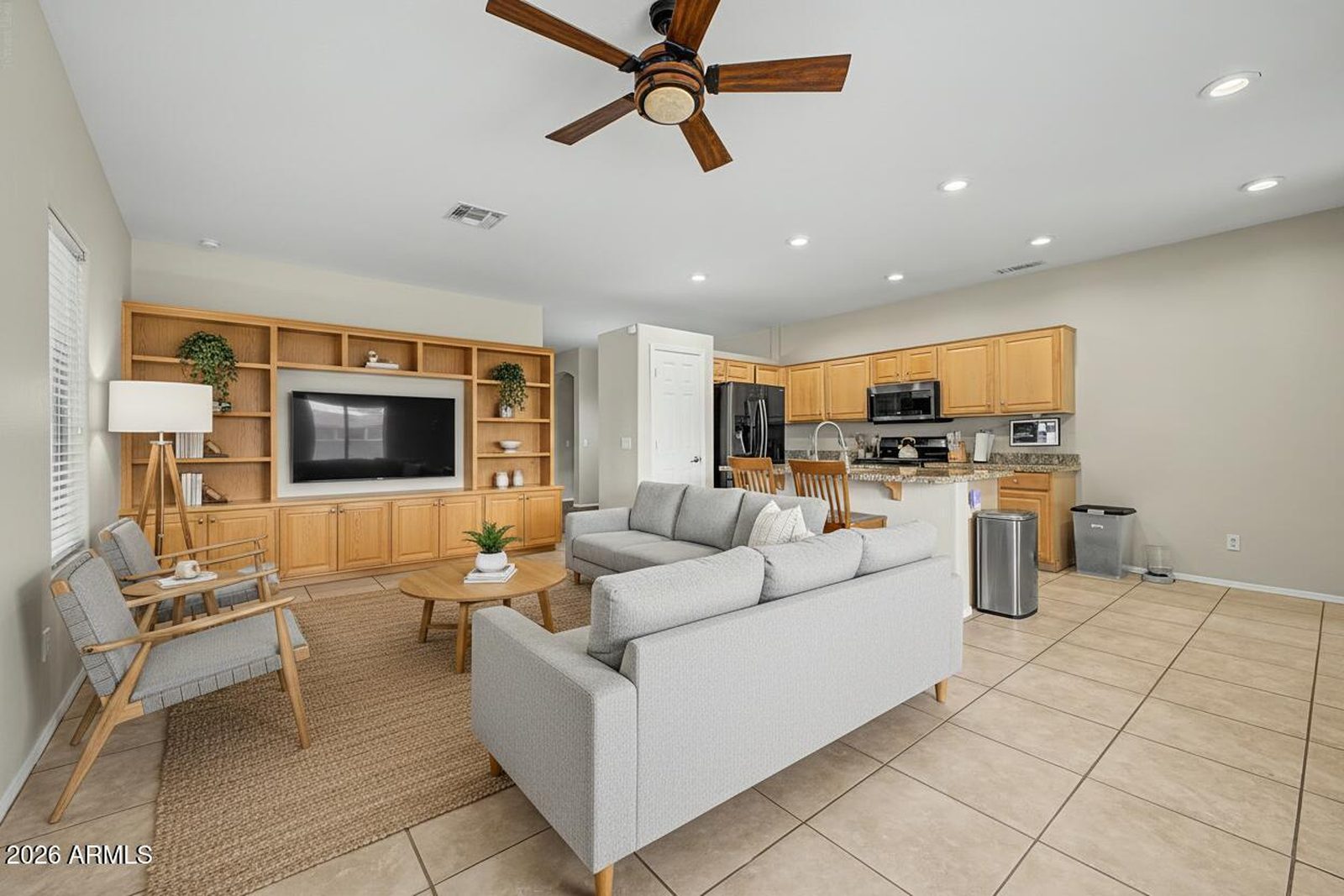 Virtually staged living area at 1820 S 84th Dr in Tolleson, Arizona