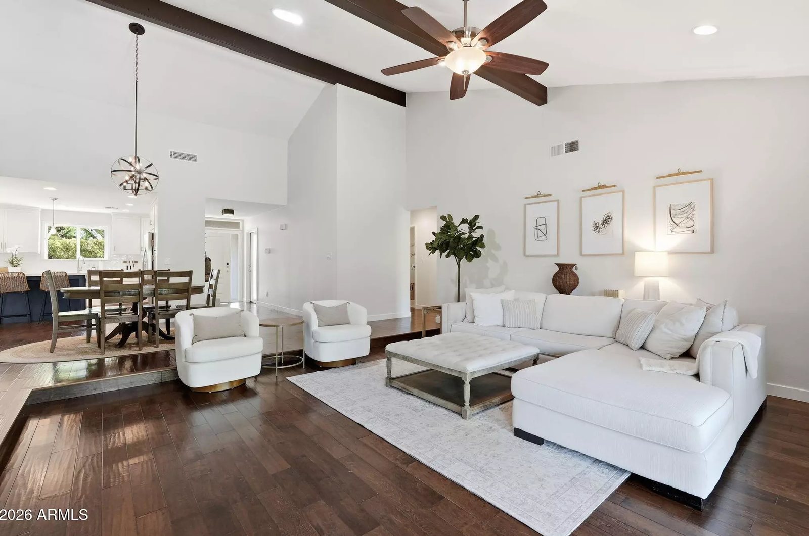 Living room with hardwood floors in a Scottsdale, Arizona brokerage listing