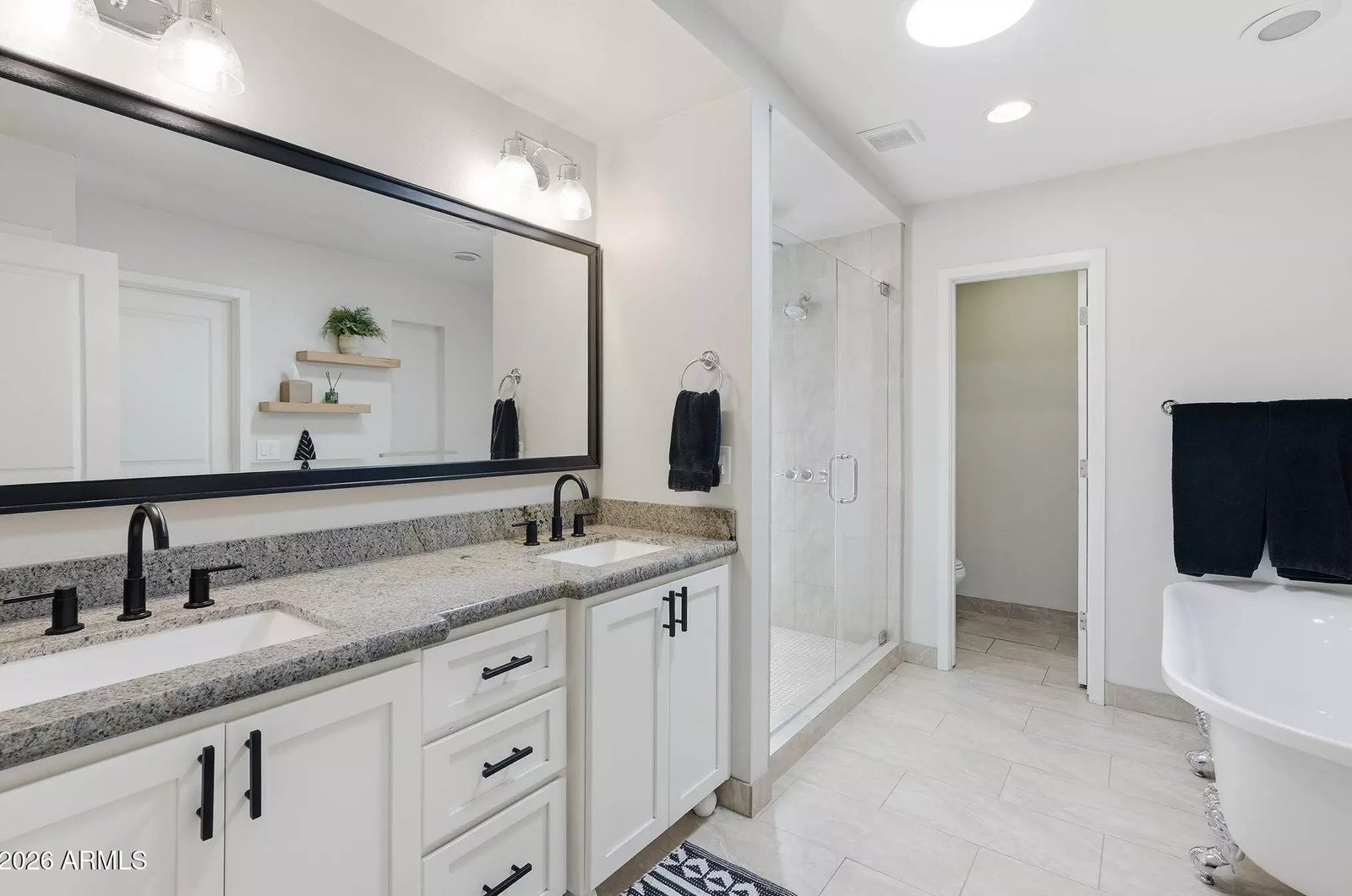Bathroom with dual vanities in a Scottsdale, Arizona brokerage listing